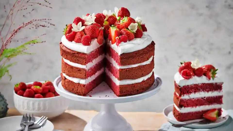 Delicious layered red velvet cake with smooth cream cheese frosting.