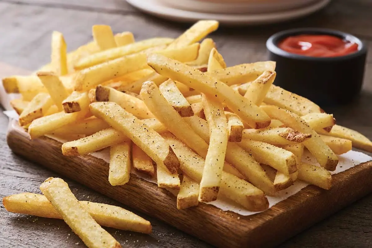 Crispy basket fries served in a basket with ketchup dip