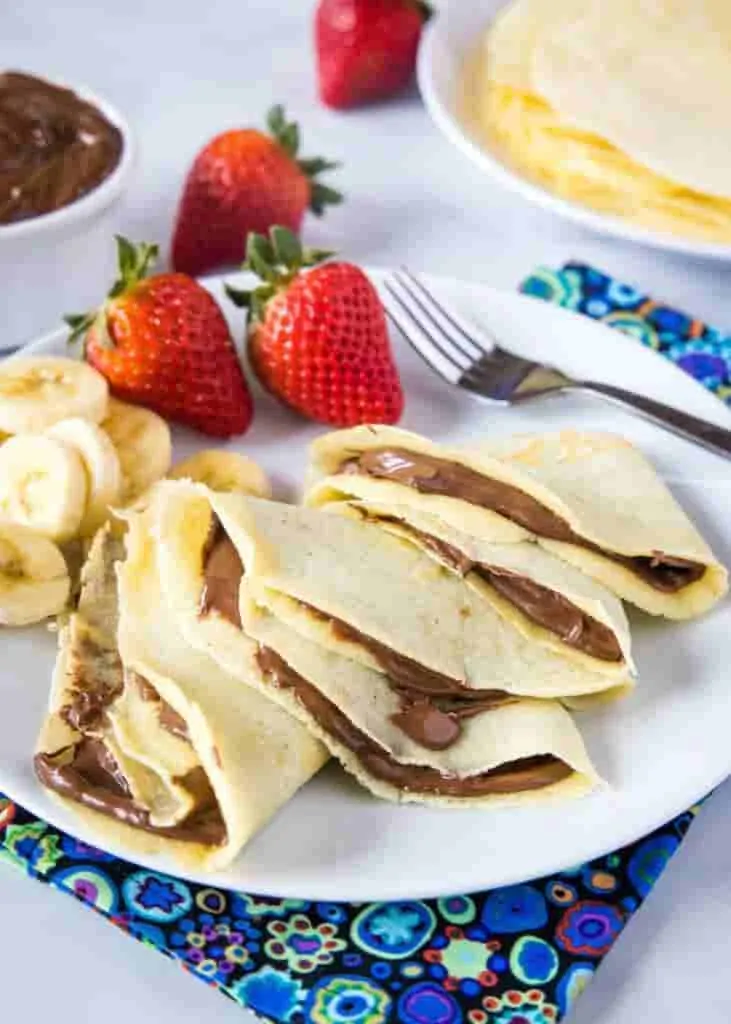 Thin crepes filled with creamy Nutella chocolate spread